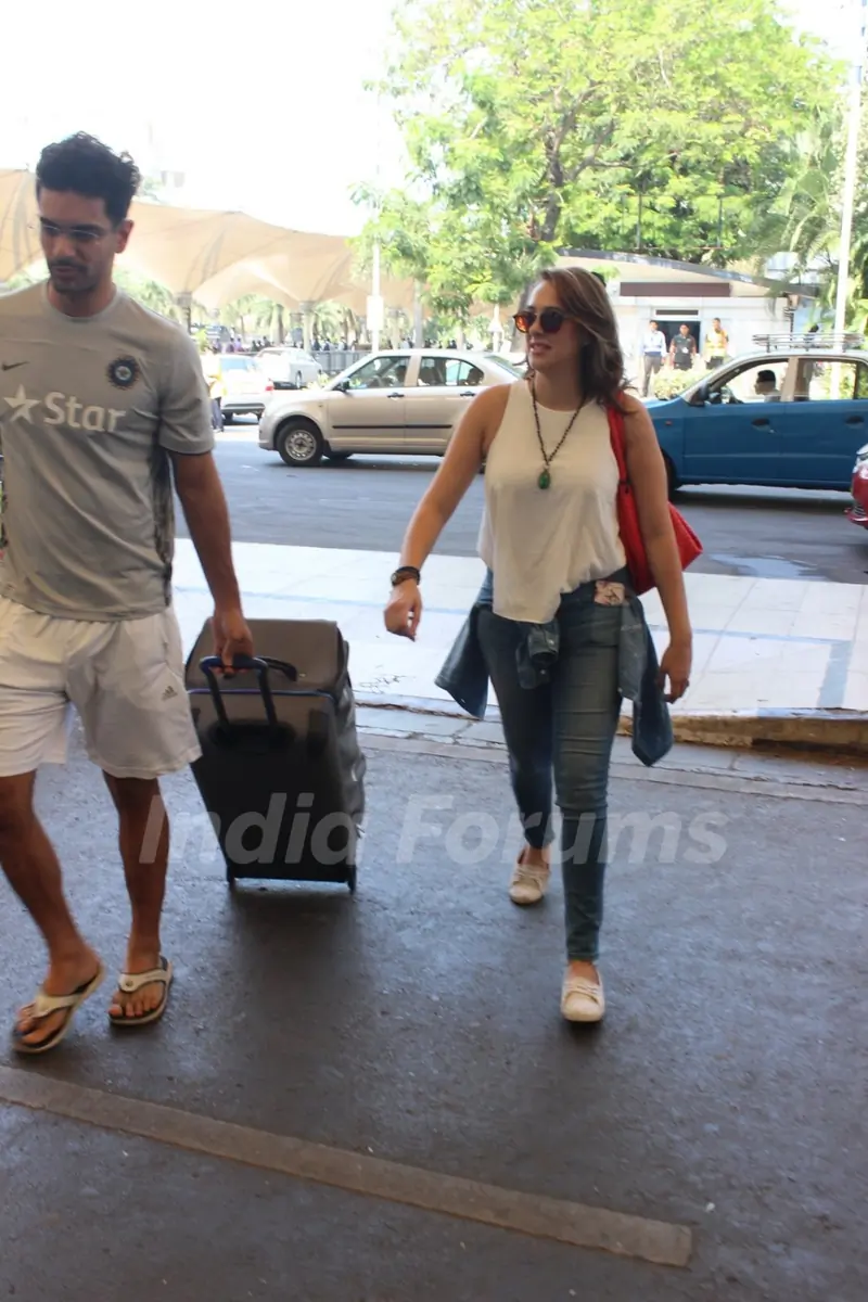 Hazel Keech with Angad Bedi Snapped at Airport