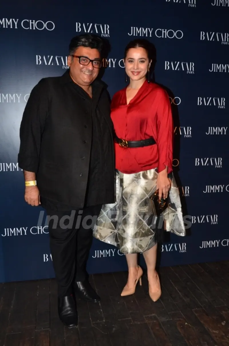 Simone Singh poses with Farhad Samar at the Launch of Jimmy Choo Eyewear Launch