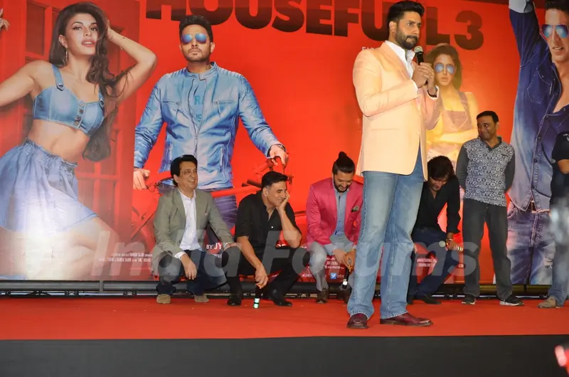 While Abhishek interacts with media, the rest sits down - at Housefull 3 Success Meet!