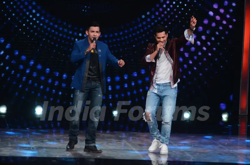 Varun Dhawan with Aditya Narayan during Promotions of 'Dishoom' on Sa Re Ga Ma Pa 2016
