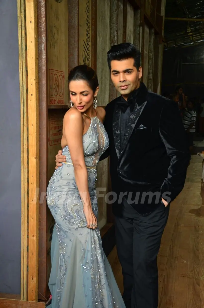 Karan Johar and Malaika Arora Khan posing at Promotion of 'Dishoom' on India's Got Talent