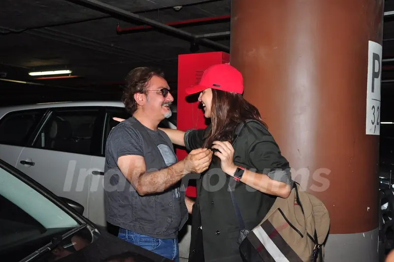 Neha Dhupia snapped hugging Vinay Pathak at Airport