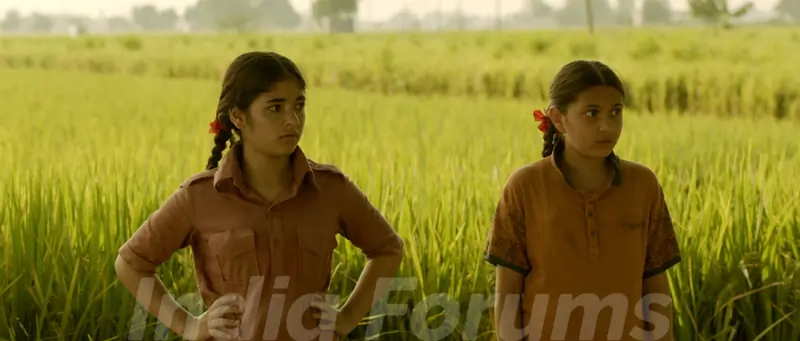 Still of Zaira Wasim and Suhani Bhatnagar from Dangal