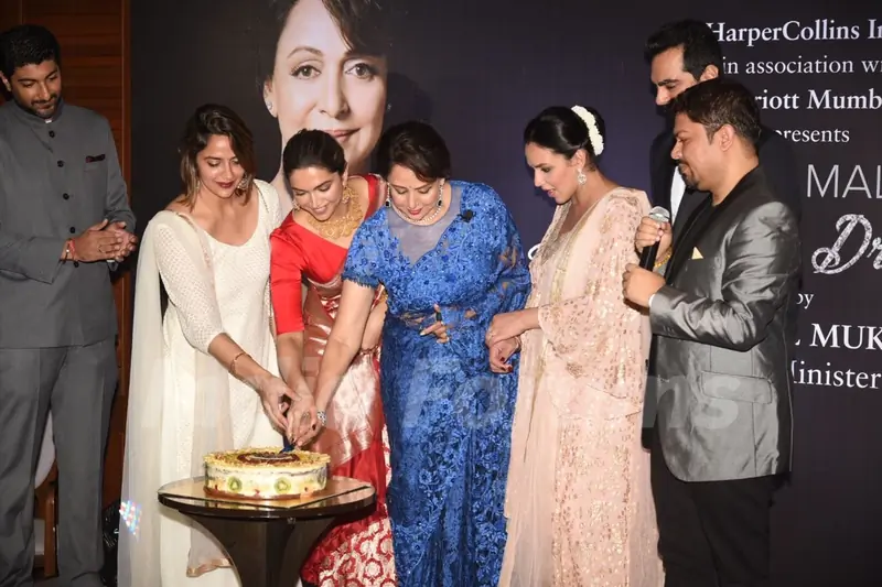 Hema Malini cuts her birthday cake