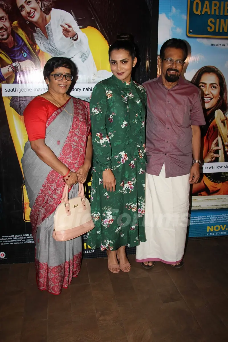 Parvathy with her parents