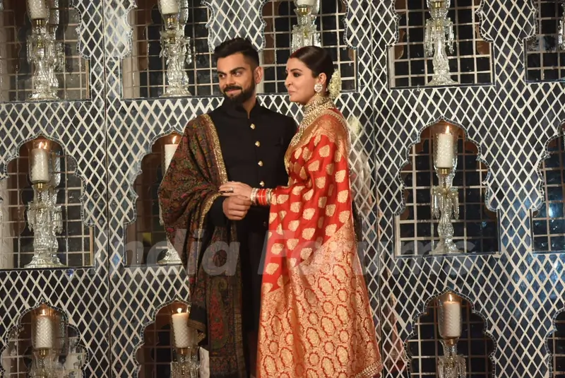 The background blends well with their attire