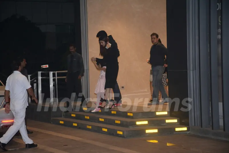 Aishwarya, Abhishek with Aaradhya outside an eatery