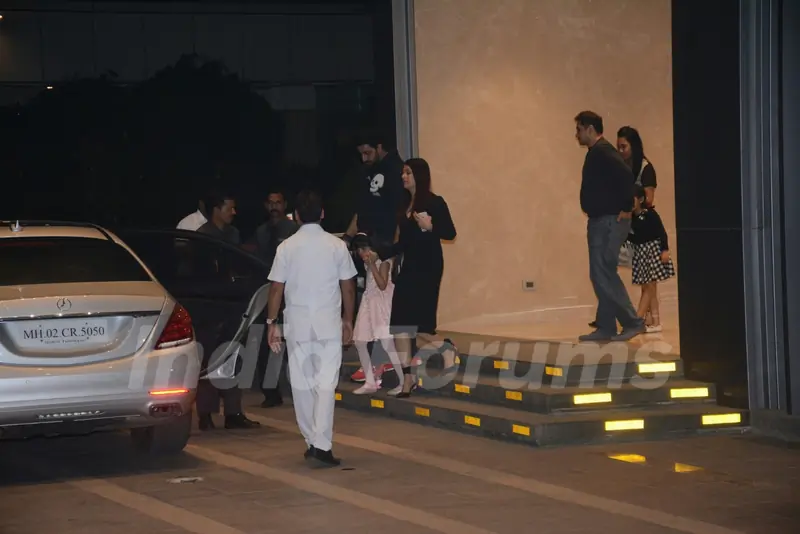 Aishwarya, Abhishek with Aaradhya outside an eatery