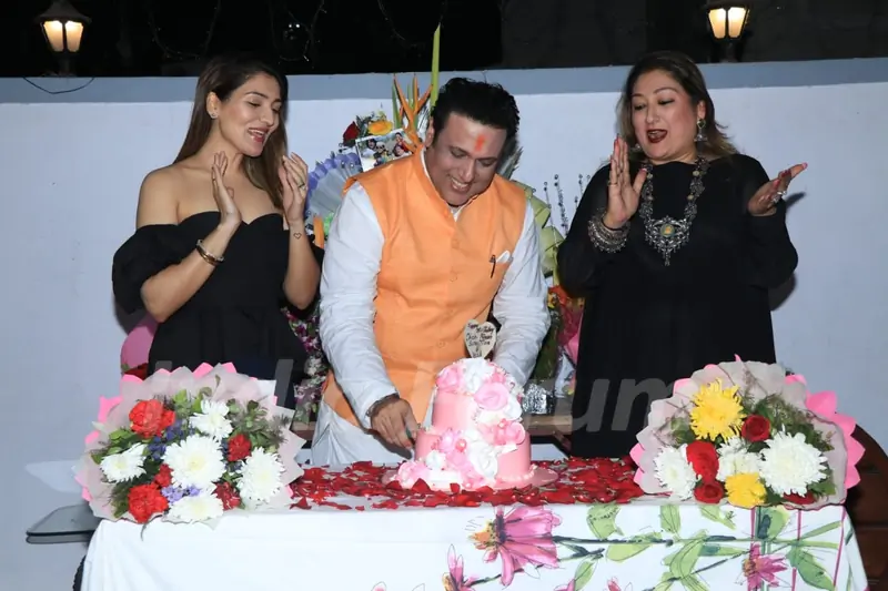 Govinda with his daughter and wife at his Birthday Bash