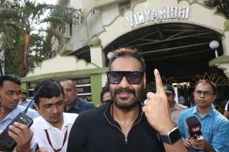 Ajay Devgn Kajol with Son Yug for Voting