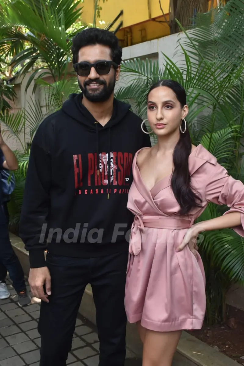 Vicky Kaushal and Nora Fatehi at Pachtaoge success bash!