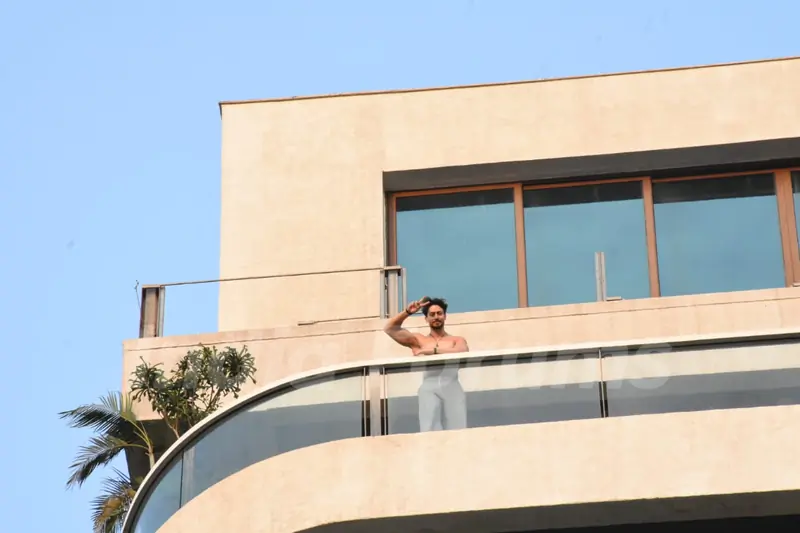 Tiger Shroff snapped flexing muscles in his balcony