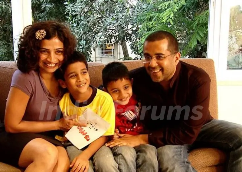 Chetan Bhagat with his wife Anusha and sons Ishaan (left), Shyam (right)
