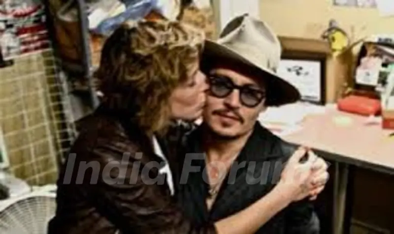 Johnny Depp with his girlfriend Kiley Evans