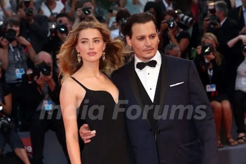 Johnny Depp with his girlfriend Amber Heard