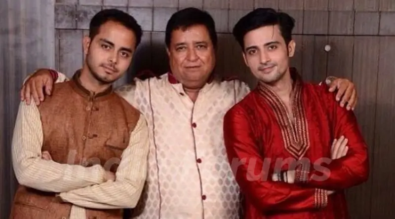 Mukul Harish with his father and brother