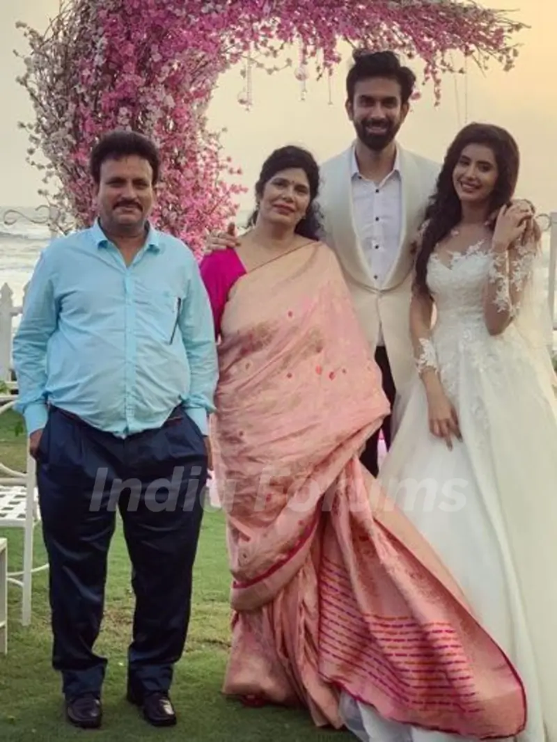 Charu Asopa with her parents and husband