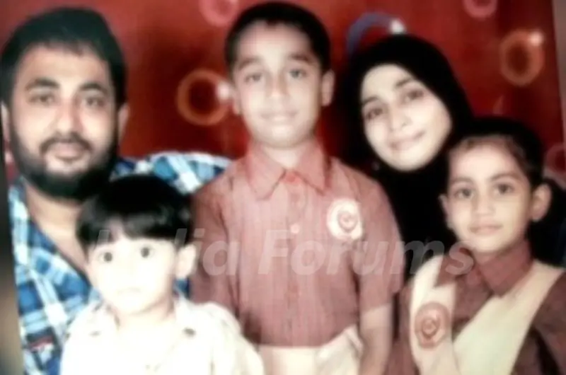 Zubair Khan with his wife and children