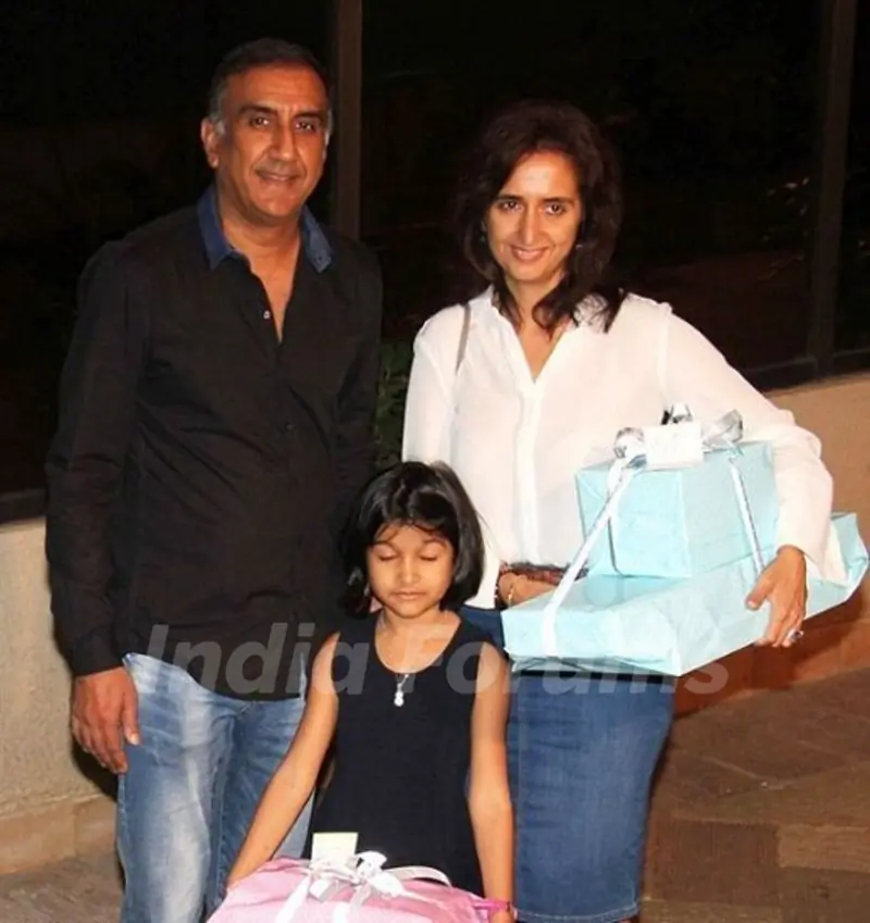 Milan Luthria with his wife and daughter