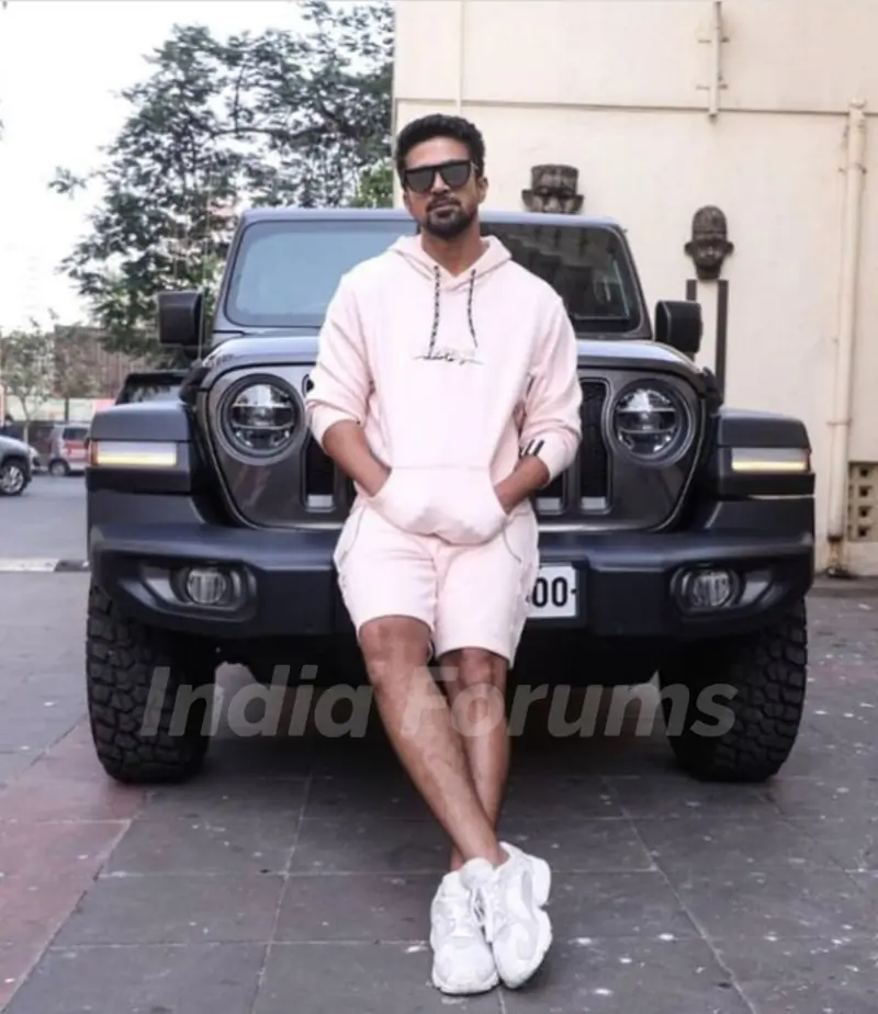Saqib posing with his jeep