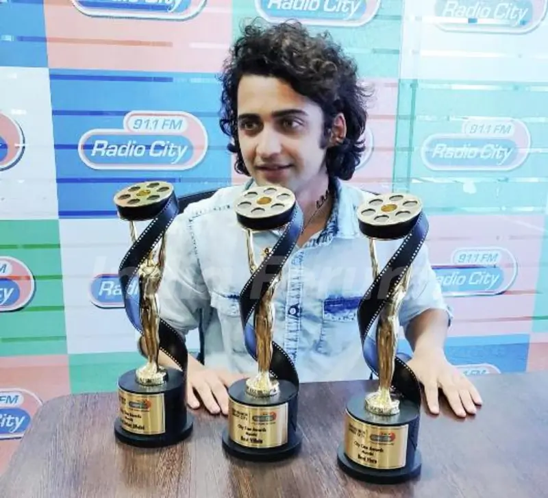 Sumedh Mudgalkar with his Awards