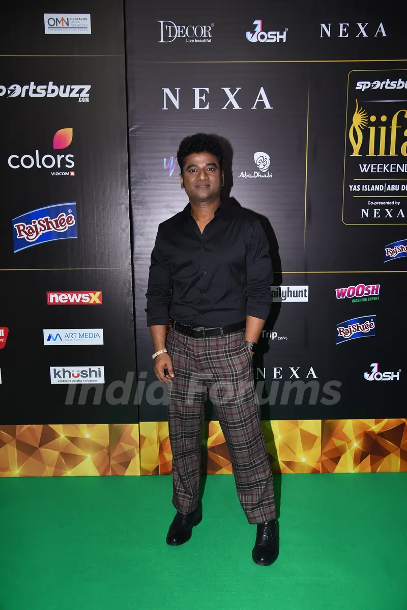 Devi Sri Prasad poses on the green carpet of IIFA awards 2022
