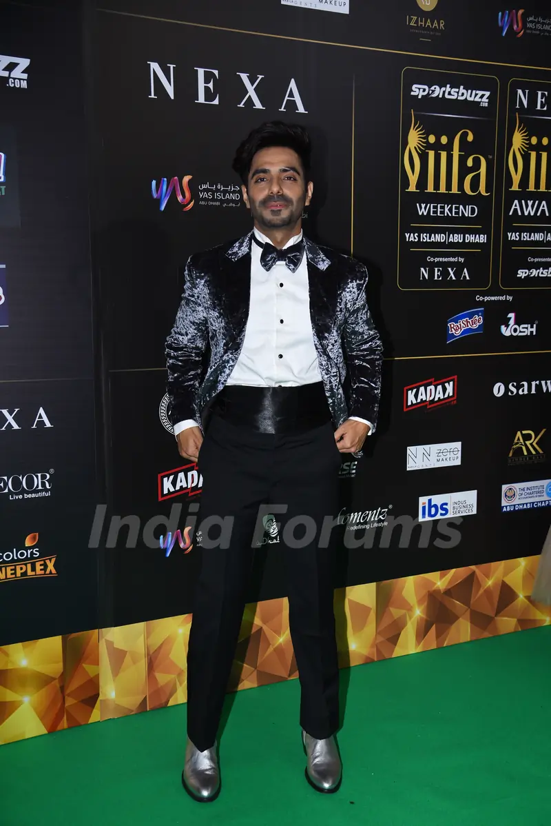 Aparshakti Khurana poses to paparazzi at green carpet of IIFA awards 2022 in Abu Dhabi