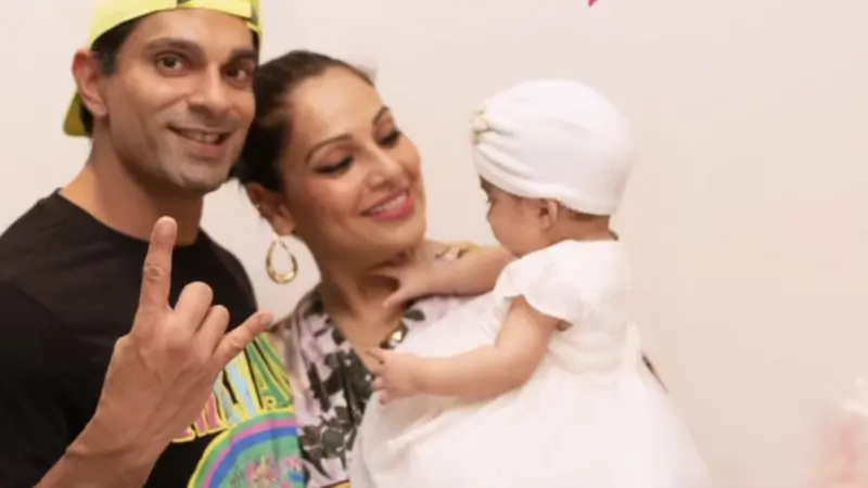 Karan Singh Grover, Bipasha Basu and Devi Basu Singh Grover 