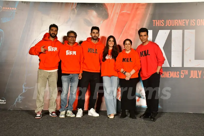 Karan Johar, Raghav Juyal and Guneet Monga snapped at the trailer launch of kill