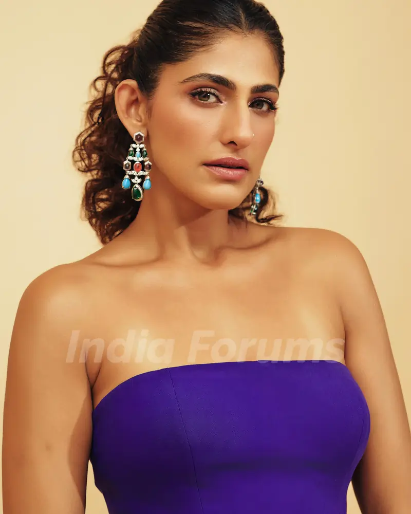 Kubbra Sait slaying in tube purple gown