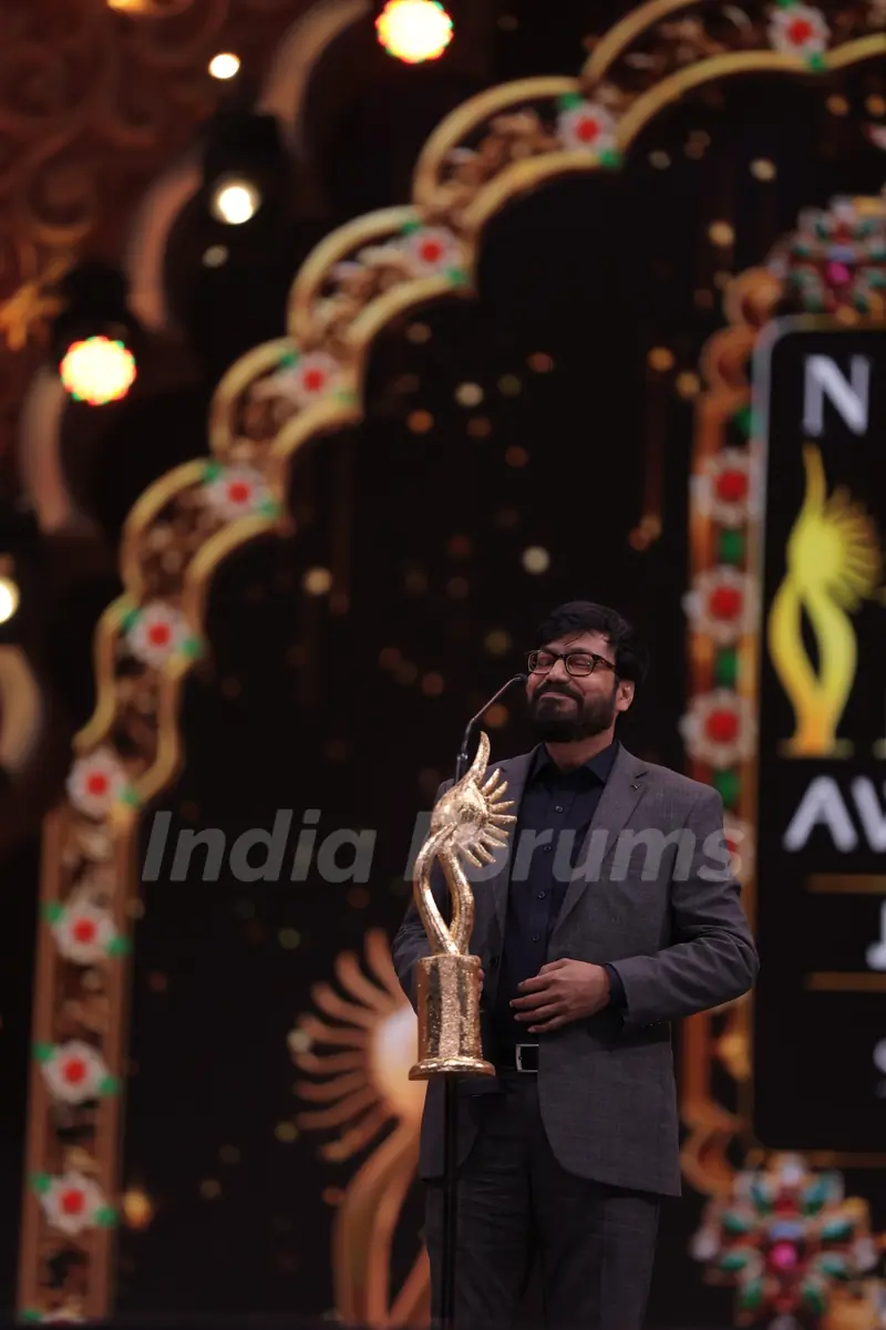 Bipin Goswami wins Best Story (Original) in the Popular Category at the NEXA IIFA Awards 2025.