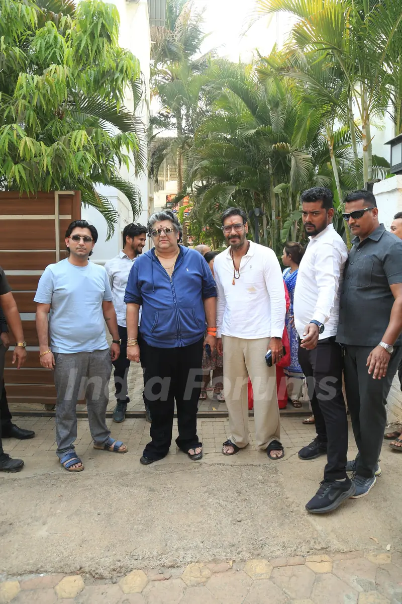 Ajay Devgn and Bharat M snapped in the city