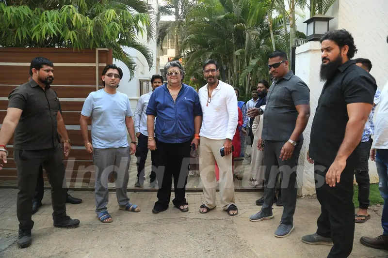 Ajay Devgn and Bharat M snapped in the city