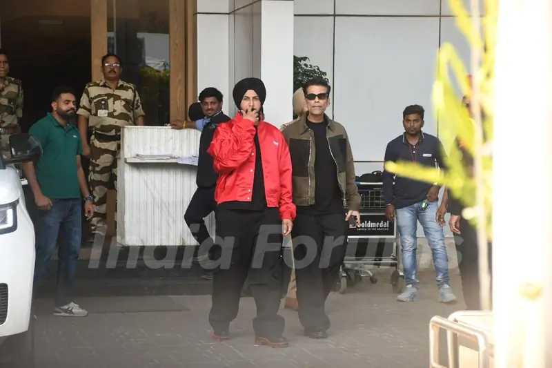 Karan Johar and Gippy Grewal snapped at Kalina Airport after the promotions of Akaal