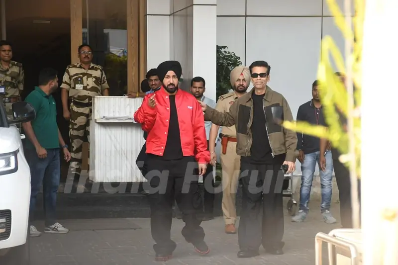 Karan Johar and Gippy Grewal snapped at Kalina Airport after the promotions of Akaal