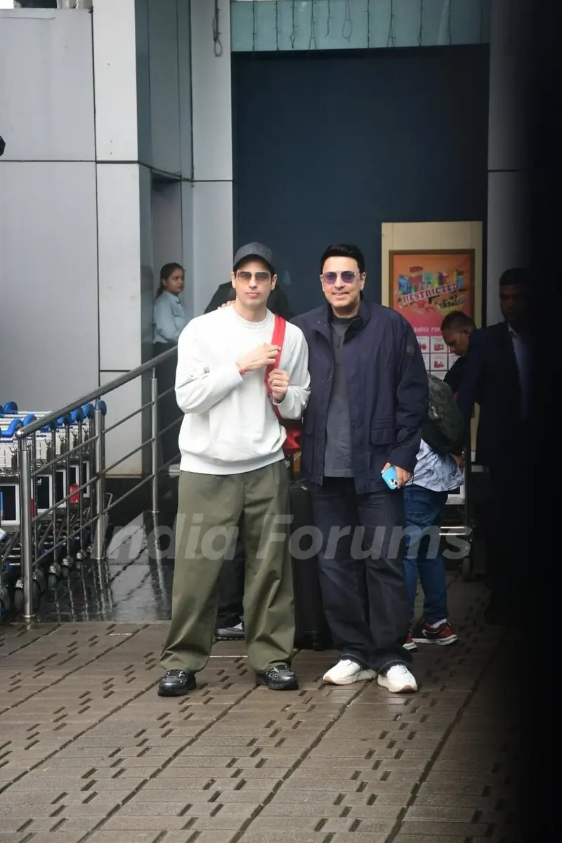 Dinesh Vijan and Sidharth Malhotra snapped at Kalina airport
