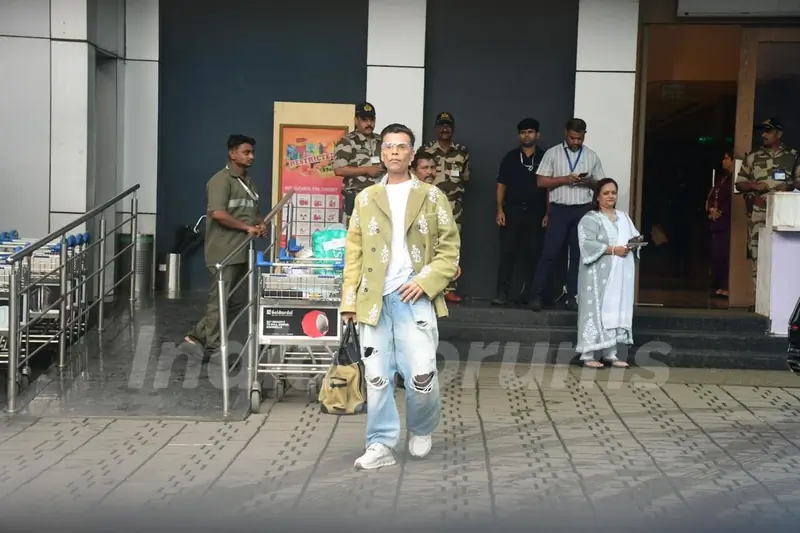 Karan Johar spotted at Kalina Airport