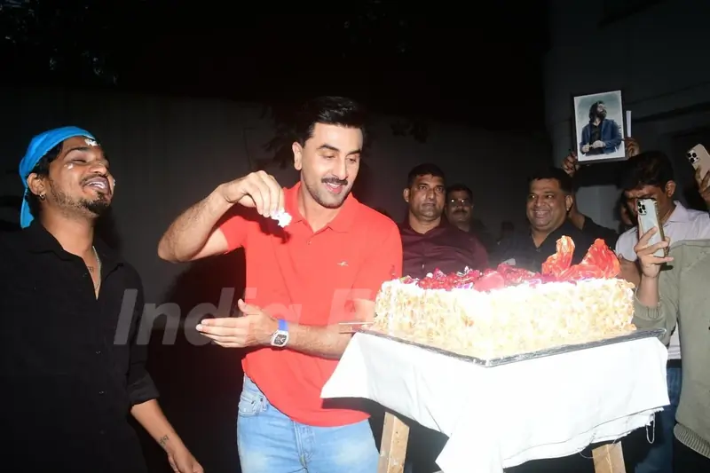 Ranbir Kapoor  snapped celebrating his birthday with paps at his residence in Bandra