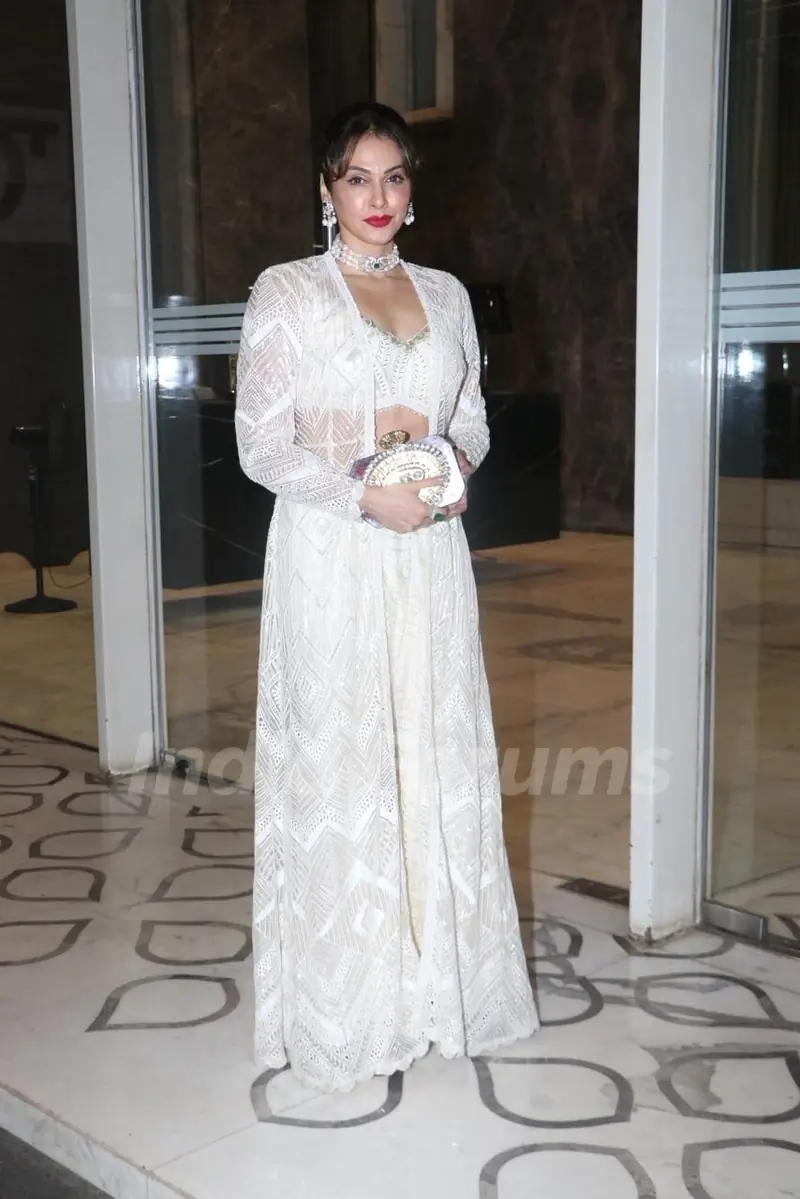 Isha Koppikar  snapped attending Mika Singh’s Diwali party