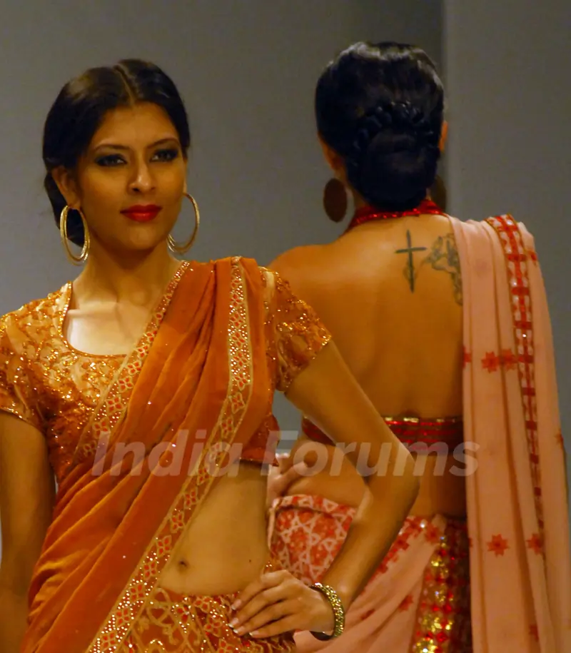 A model at the ramp display Satya Paul colloction during the Kolkata Fashion Week in Kolkata on 12th Sep 09