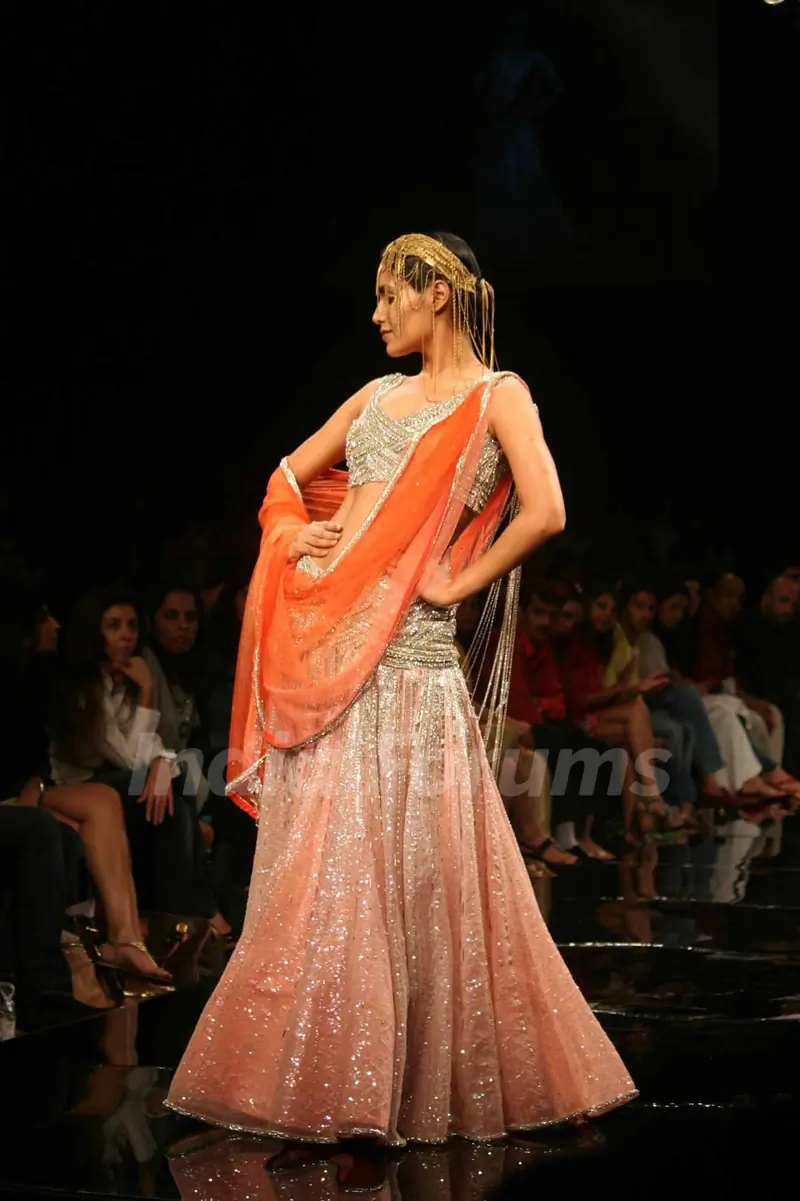 A model walks the runway at Rakesh Aggarwal show at the Lakme Fashion Week Spring/Summer 2010 Day 5, in Mumbai