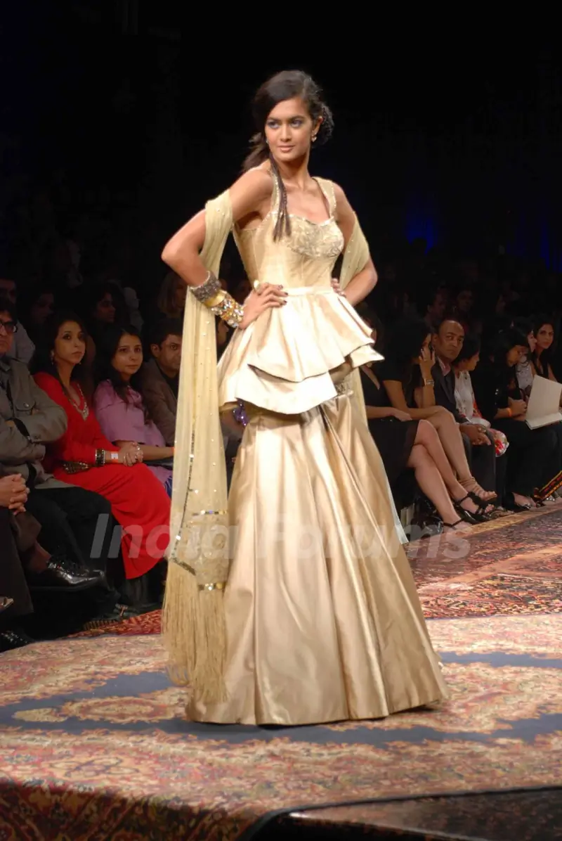 A model walks the runway at Tarun Tahiliani show at the Lakme Fashion Week Spring/Summer 2010 Day 5, in Mumbai