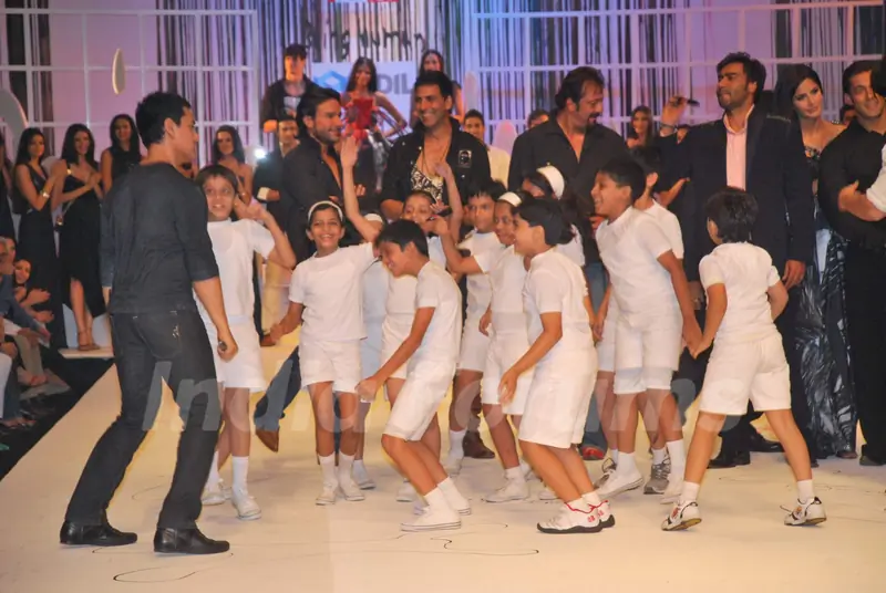 Govinda, Sanjay Dutt, Ajay Devgun, Aamir Khan and Katrina Kaif at Salman Khan''s Being Human show at HDIL India Couture Week on Day 2