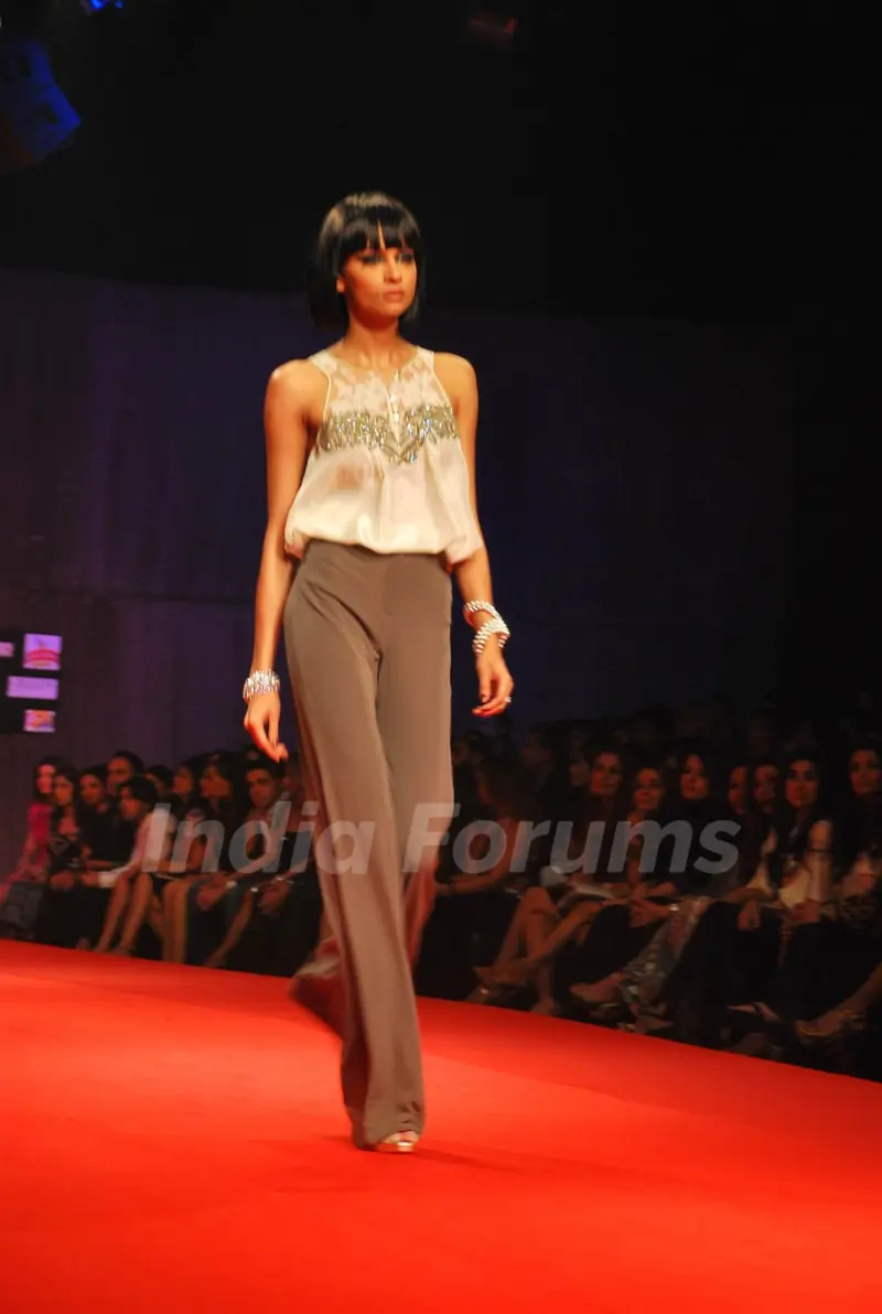 Models walk on the ramp for Designers Monisha Jaising