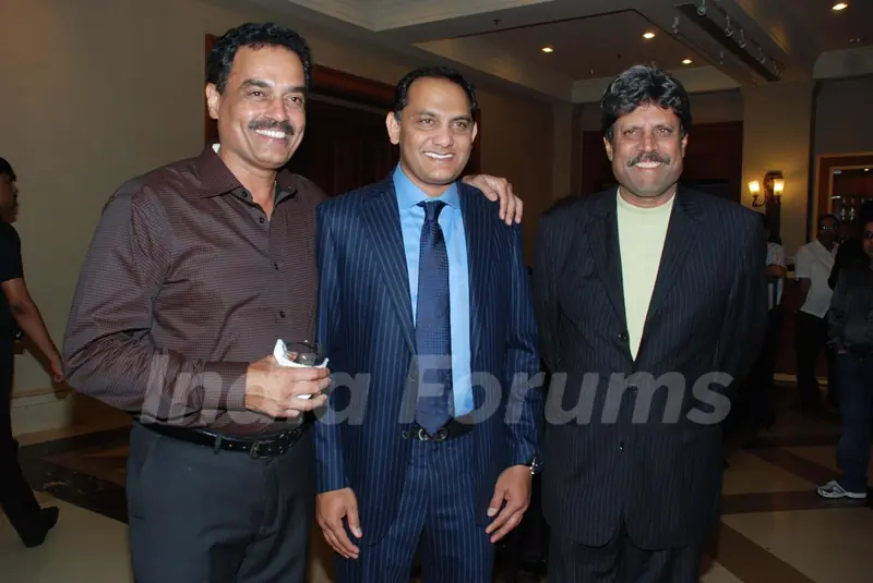 Cricketers Dilip Wengerksar, Mohammad Azharuddin and Kapil Dev at the bash of Videocon''s Aniruddh Dhoot