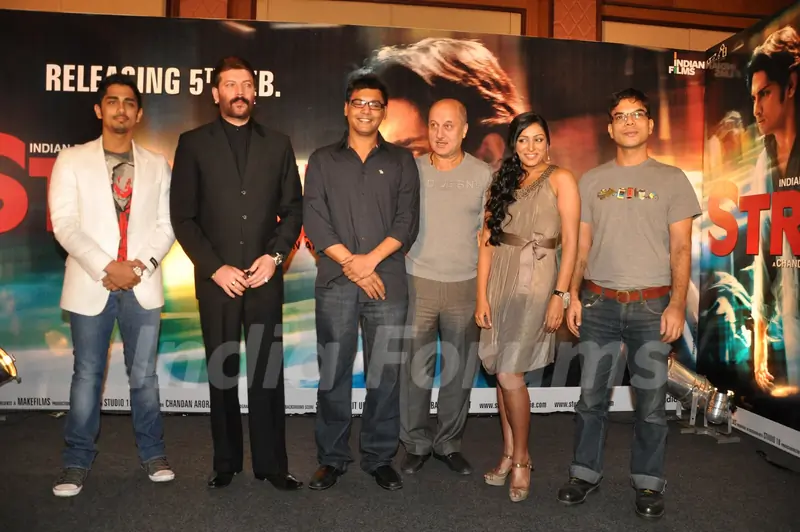 Bollywood actors Siddharth, Aditya Pancholi, and Anupam Kher at the music launch of &quot;Striker&quot; in Mumbai