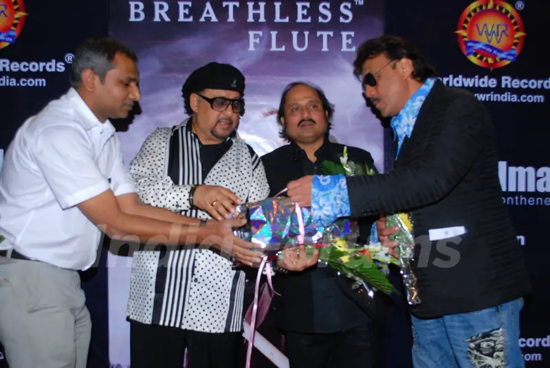 Jazz Musician Louis Banks, Pandit Ronu Majumdar and Jackie Shroff pose for the photographers during their album launch of "Breathless Flute" in Mumbai