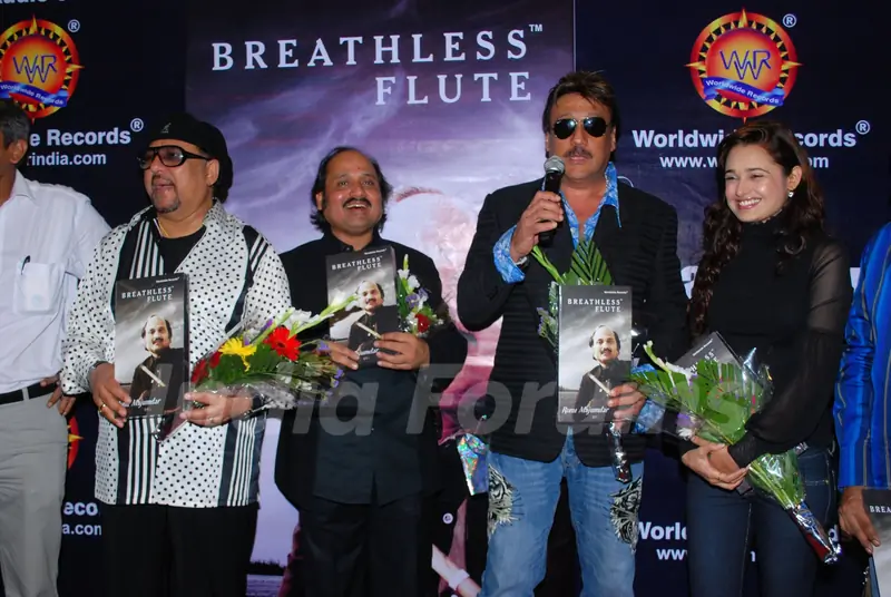Jazz Musician Louis Banks, Pandit Ronu Majumdar, Jackie Shroff and Yuvika Chaudhary pose for the photographers during their album launch of "Breathless Flute" in Mumbai