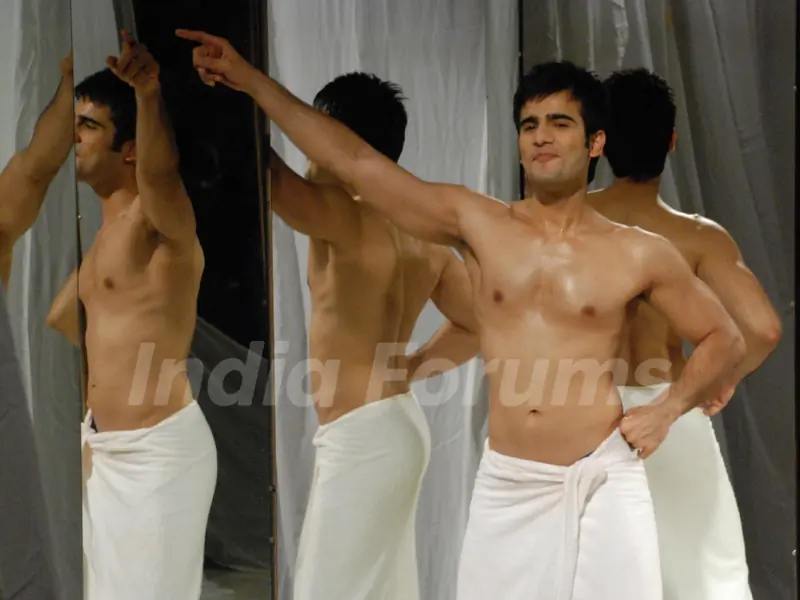 Karan Tacker in towel
