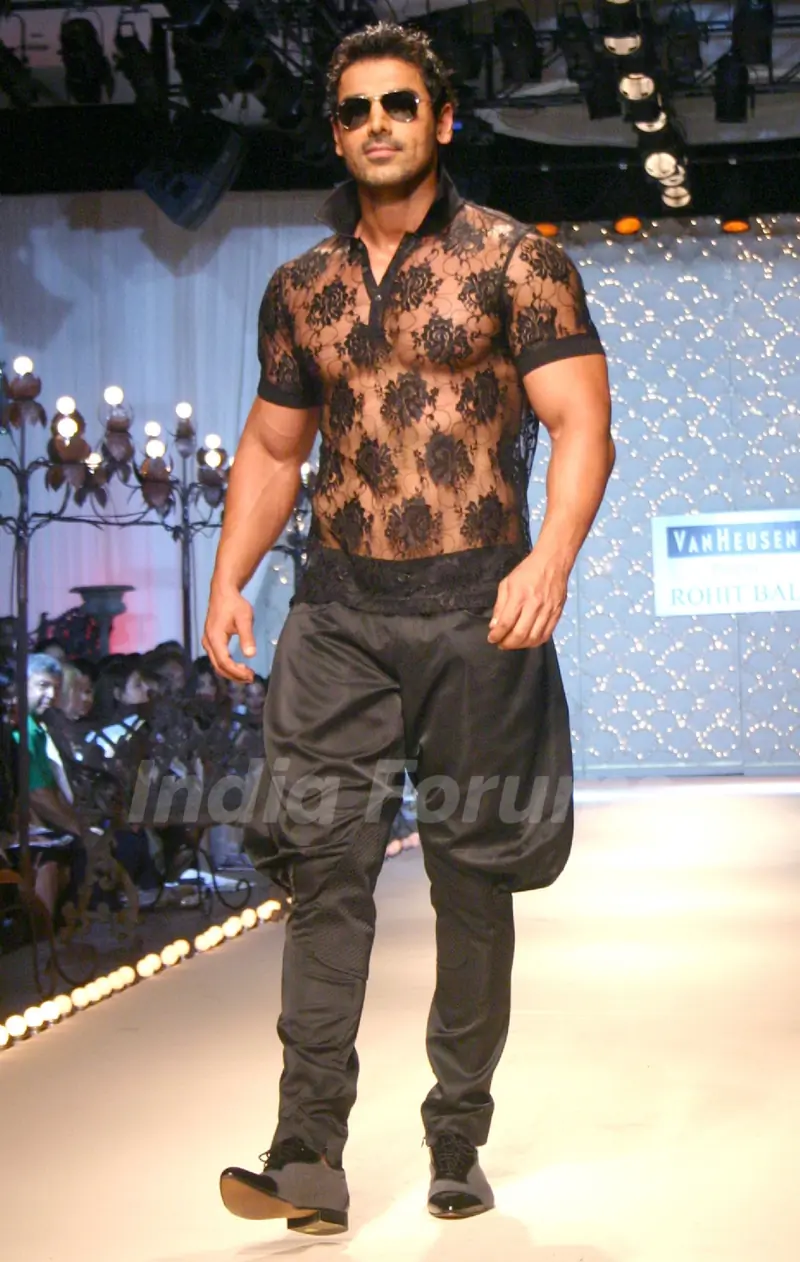 John Abraham showcasing designer Rohit Bal''s creation at the Ven Heusen India Mens Week, in New Delhi